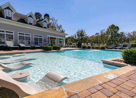 Resort-style pool and tanning ledge at Magnolia Preserve