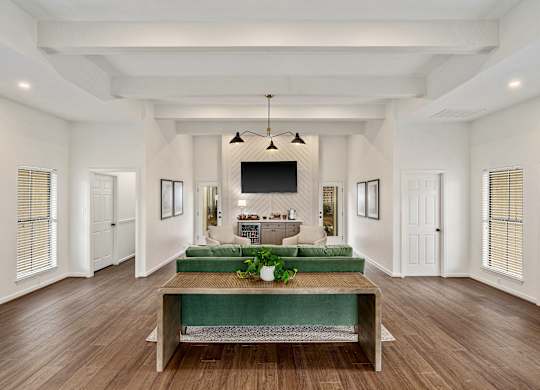 Clubhouse entry at Oakley at Hillcrest with seating and entry table