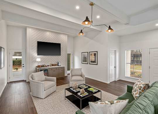 Resident clubhouse with tv and seating at Oakley at Hillcrest in Mobile, AL