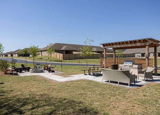 A park with a pavilion and seating area.