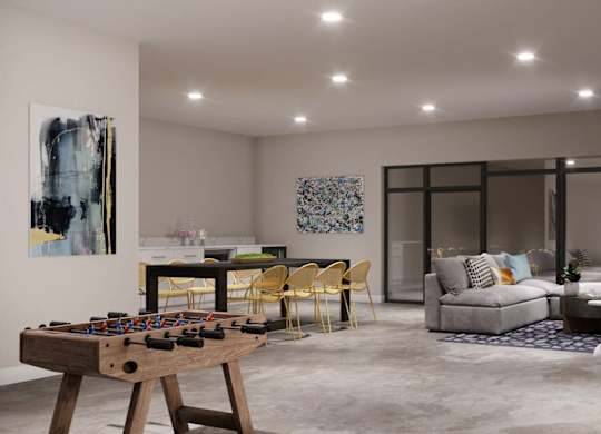 A modern resident lounge and game room at Wesley Place Apartments in Indianapolis, Indiana