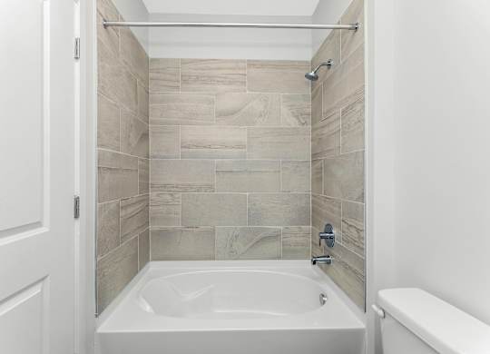 Tub shower combo with tile surround at Southern at Santa Rosa