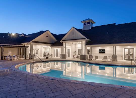 A house with a pool in the backyard.