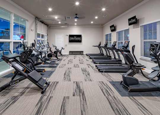 Large 24-hour fitness center with tvs Southern at Santa Rosa