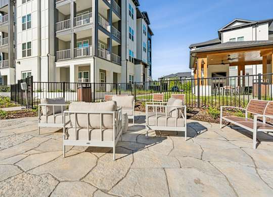the preserve at ballantyne commons courtyard with furniture and apartments