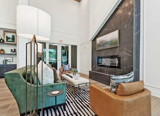 a living room with couches and a fireplace