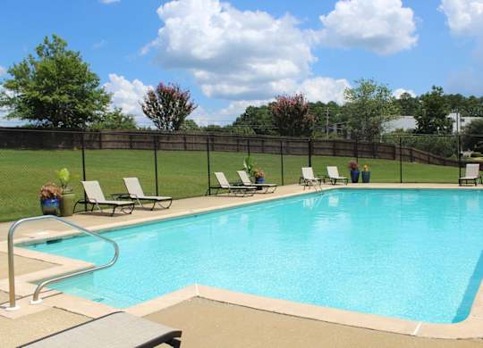 Swimming pool and sundeck at The Avery at Auburn Apartments in Auburn, AL