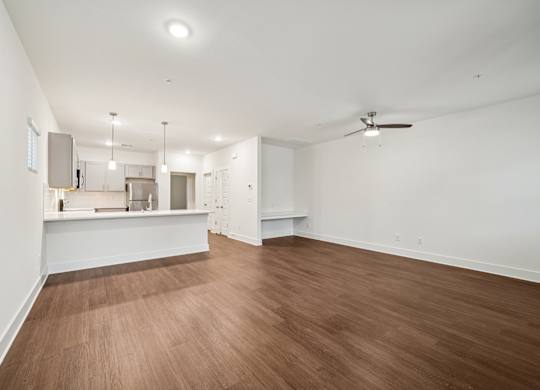 Open concept living and kitchen at Turnberry Park Apartments in Gardendale, AL