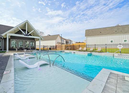Resort-style pool with sundeck  at Turnberry Park Apartments in Gardendale, AL
