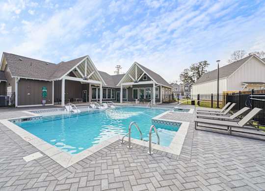 Resort-style pool with sundeck  at Turnberry Park Apartments in Gardendale, AL