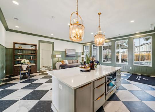 Clubhouse kitchen with island at Turnberry Park Apartments in Gardendale, AL