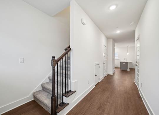 Hallway and stairs Willow floor plan at Turnberry Park Apartments in Gardendale, AL
