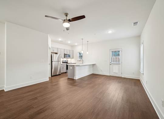 Open concept living and kitchen at Turnberry Park Apartments in Gardendale, AL