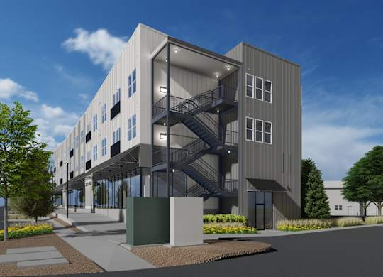 a rendering of the exterior of West Row Lofts and Townhomes in Birmingham, AL
