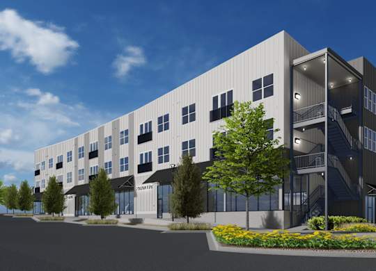 a rendering of the exterior of West Row Lofts and Townhomes in Birmingham, AL