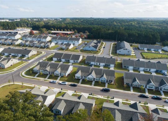 an aerial view of a neighborhood of houses