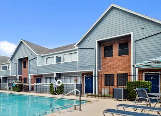 the swimming pool at the apartments tx