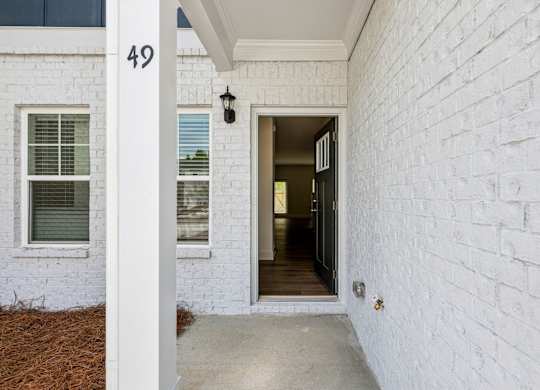 A white building with the number 49 on it.