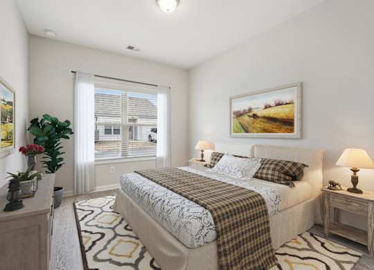 A bedroom with a large bed and a painting on the wall.
