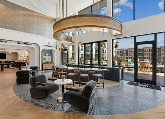 A modern living room with a curved wooden ceiling and a large window.
