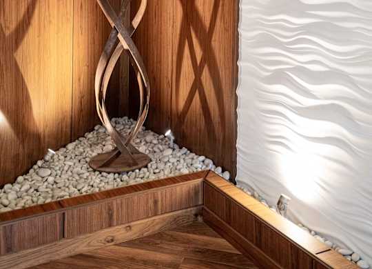 Accent wall in lobby with sculpture