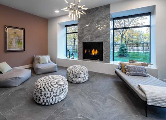 the stairs in the interior of a house with a fireplace