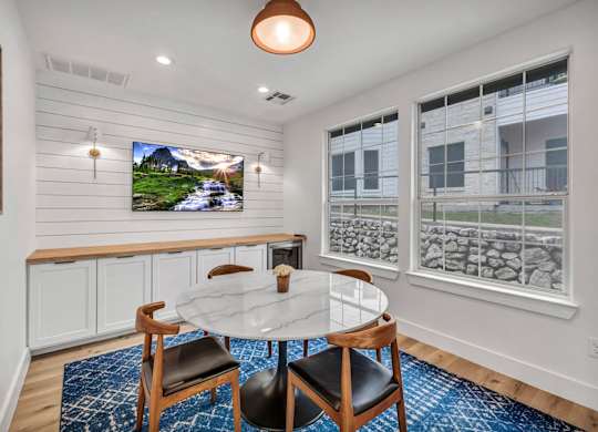 resident lounge area with furnished private working room