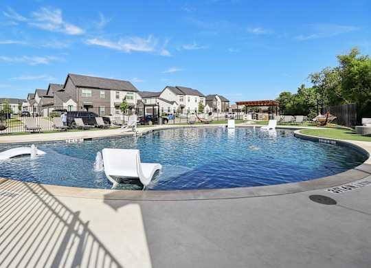 Outdoor swimming pool at Townhomes at Princeton Meadows, townhomes in Princeton, TX