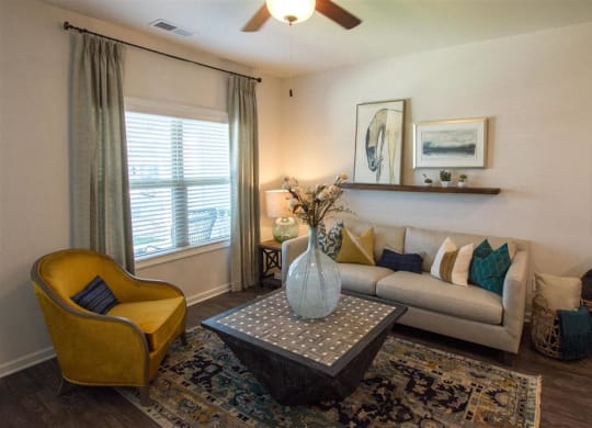 a living room with a couch and a table