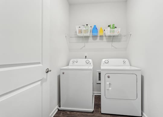 A laundry room with a washer and dryer.