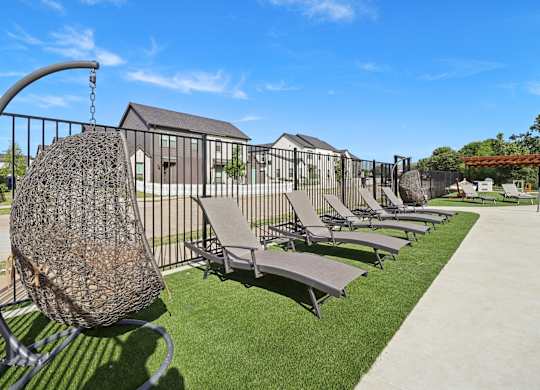 Poolside sundeck at Townhomes at Princeton Meadows, rental homes in Princeton, TX