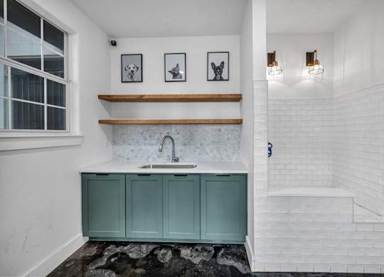 a bathroom with a sink and a bathtub