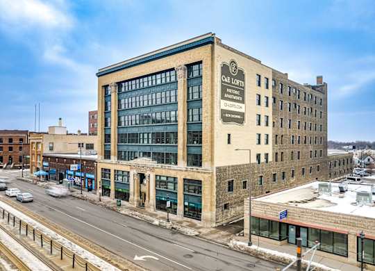 A large building with a sign that says 