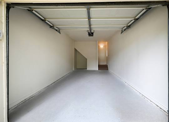 empty spacious one car garage at St Moritz in Dallas Texas