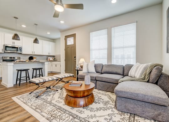 large living room with natural light and open floor plan