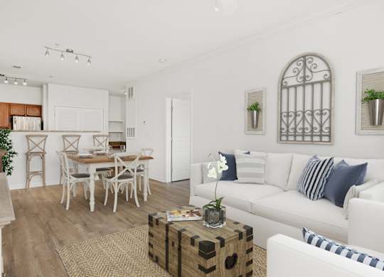 A white living room with a dining table and chairs.