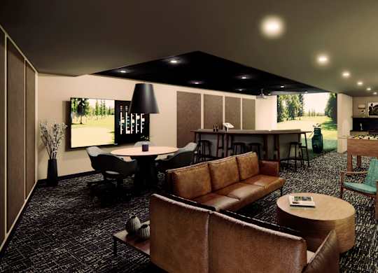 A living room with a brown couch and a black and white rug.
