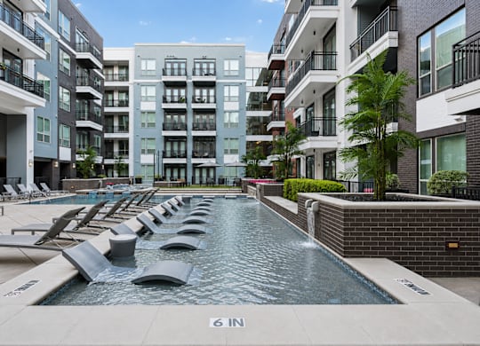 A pool in front of L2 Uptown in Dallas Texas