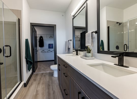 Luxury Bathroom with Double Vanity & Quartz Countertops with Expansive Closets