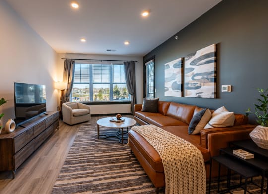 Spacious Floor Plans with Wood-Plank Flooring in Living Area