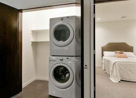 Stackable Front loading washer and dryer in linen closet