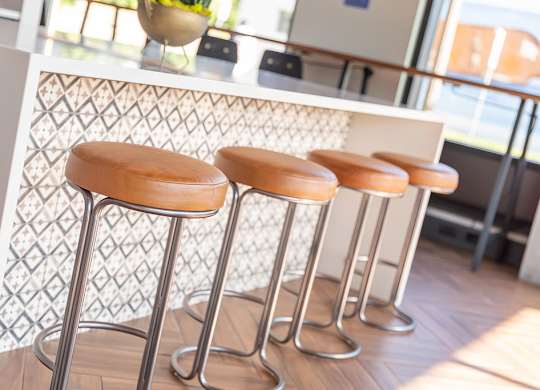 bar seating in the clubroom at Harper Apartments in St Paul, MN