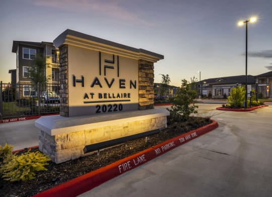 a building with a sign that says heaven at blair at dusk