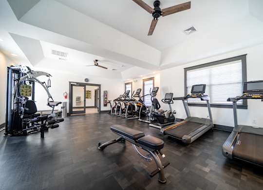 24/7 Fitness Center with Cardio Equipment and Free Weights