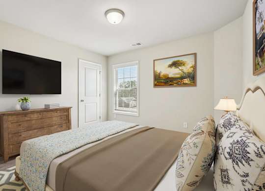 A bedroom with a bed, dresser, and a painting on the wall.