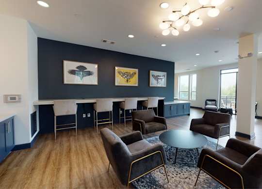 A living room with a black and white color scheme.
