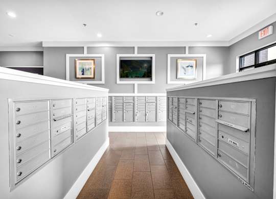 A island with mailboxes at Markethaus 3700 in Plano Texas