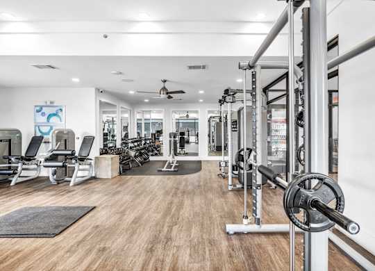 A gym with a variety of equipment at Markethaus 3700 in Plano Texas