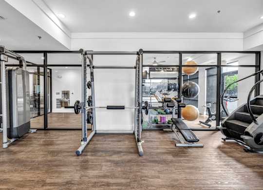 A gym with a squat rack at Markethaus 3700 in Plano Texas