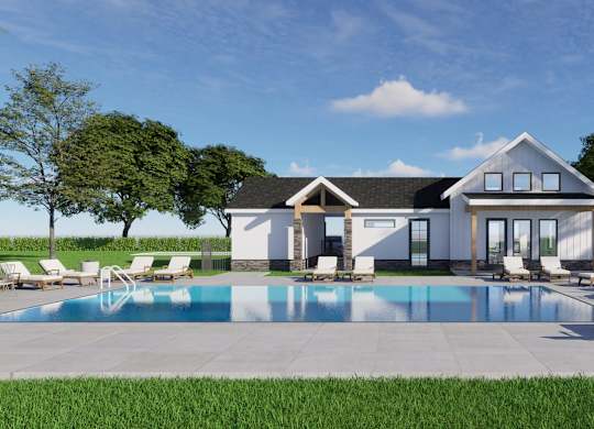 Dog-Friendly Townhomes in Spring Hill, KS - Hidden Hills - Swimming Pool with Sun Loungers, Trees, Grass, and Clubhouse